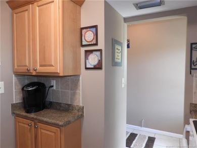 Welcome home to this updated 2 bedroom, 1 bathroom condo on Monterey Yacht and Country Club in Florida - for sale on GolfHomes.com, golf home, golf lot