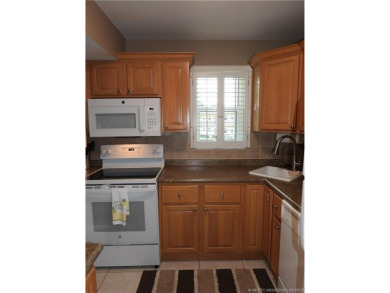 Welcome home to this updated 2 bedroom, 1 bathroom condo on Monterey Yacht and Country Club in Florida - for sale on GolfHomes.com, golf home, golf lot