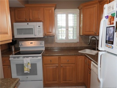 Welcome home to this updated 2 bedroom, 1 bathroom condo on Monterey Yacht and Country Club in Florida - for sale on GolfHomes.com, golf home, golf lot