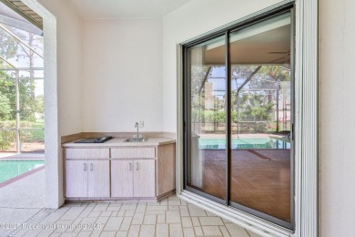 Welcome to 4371 Hunters Pass in the sought-after gated golf on Silverthorn Country Club in Florida - for sale on GolfHomes.com, golf home, golf lot