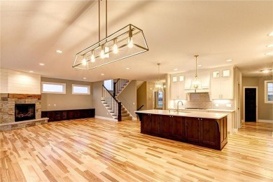 This stunning 4-bedroom, 3-bath custom-built home by Johnson on Boulder Pointe Golf Club in Minnesota - for sale on GolfHomes.com, golf home, golf lot