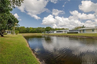 Enjoy peaceful water views and your own Mango Tree from this on Savanna Golf Club in Florida - for sale on GolfHomes.com, golf home, golf lot