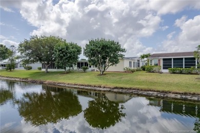 Enjoy peaceful water views and your own Mango Tree from this on Savanna Golf Club in Florida - for sale on GolfHomes.com, golf home, golf lot