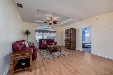 Enjoy peaceful water views and your own Mango Tree from this on Savanna Golf Club in Florida - for sale on GolfHomes.com, golf home, golf lot