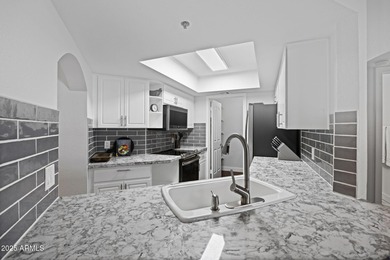 Enjoy effortless Biltmore living from this beautifully updated on Arizona Biltmore Golf and Country Club in Arizona - for sale on GolfHomes.com, golf home, golf lot