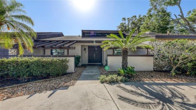 Tucked away among mature trees and lush landscaping, this on IMG Academies Golf and Country Club in Florida - for sale on GolfHomes.com, golf home, golf lot