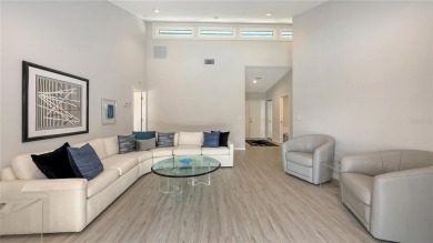 Tucked away among mature trees and lush landscaping, this on IMG Academies Golf and Country Club in Florida - for sale on GolfHomes.com, golf home, golf lot