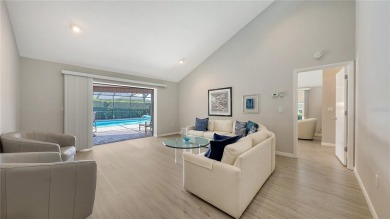 Tucked away among mature trees and lush landscaping, this on IMG Academies Golf and Country Club in Florida - for sale on GolfHomes.com, golf home, golf lot