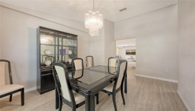 Tucked away among mature trees and lush landscaping, this on IMG Academies Golf and Country Club in Florida - for sale on GolfHomes.com, golf home, golf lot