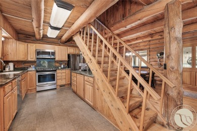 Escape to your own private sanctuary in this quaint log home on on The Briarwood in Montana - for sale on GolfHomes.com, golf home, golf lot