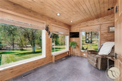 Escape to your own private sanctuary in this quaint log home on on The Briarwood in Montana - for sale on GolfHomes.com, golf home, golf lot