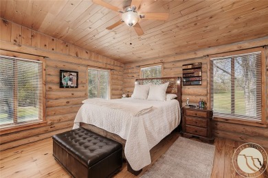 Escape to your own private sanctuary in this quaint log home on on The Briarwood in Montana - for sale on GolfHomes.com, golf home, golf lot