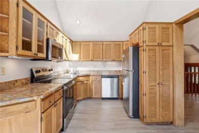 This spacious end unit townhome is beautifully situated on a on Oak Glen Golf Club  in Minnesota - for sale on GolfHomes.com, golf home, golf lot