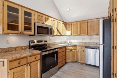 This spacious end unit townhome is beautifully situated on a on Oak Glen Golf Club  in Minnesota - for sale on GolfHomes.com, golf home, golf lot