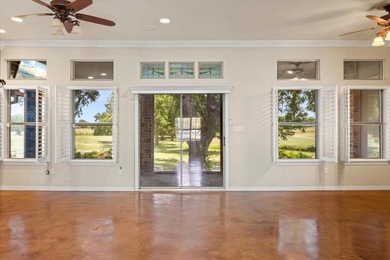 Inspiring elegance and golf course views combine in this move-in on Granbury Country Club in Texas - for sale on GolfHomes.com, golf home, golf lot