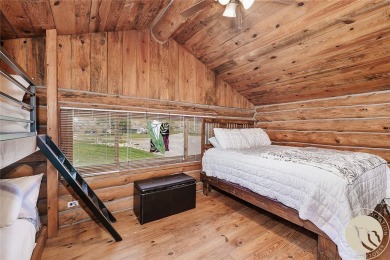 Escape to your own private sanctuary in this quaint log home on on The Briarwood in Montana - for sale on GolfHomes.com, golf home, golf lot