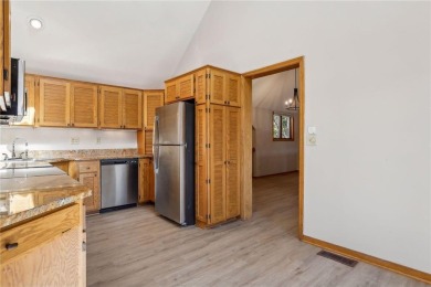 This spacious end unit townhome is beautifully situated on a on Oak Glen Golf Club  in Minnesota - for sale on GolfHomes.com, golf home, golf lot