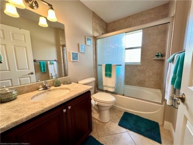 Welcome to your dream home in the serene community of Placid on Placid Lakes Country Club in Florida - for sale on GolfHomes.com, golf home, golf lot