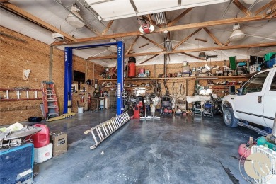 Escape to your own private sanctuary in this quaint log home on on The Briarwood in Montana - for sale on GolfHomes.com, golf home, golf lot