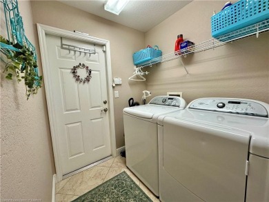 Welcome to your dream home in the serene community of Placid on Placid Lakes Country Club in Florida - for sale on GolfHomes.com, golf home, golf lot