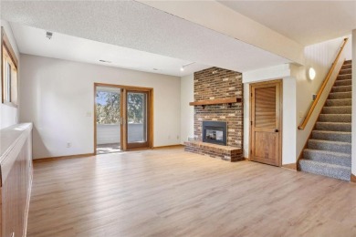 This spacious end unit townhome is beautifully situated on a on Oak Glen Golf Club  in Minnesota - for sale on GolfHomes.com, golf home, golf lot