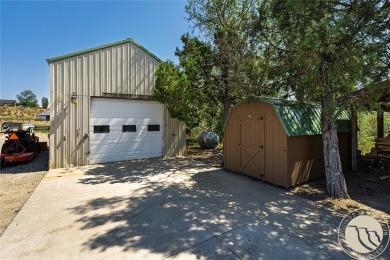 Escape to your own private sanctuary in this quaint log home on on The Briarwood in Montana - for sale on GolfHomes.com, golf home, golf lot