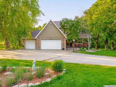 Nestled on over an acre on a scenic private drive, this on Highland Park Golf Course in Iowa - for sale on GolfHomes.com, golf home, golf lot