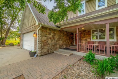 Nestled on over an acre on a scenic private drive, this on Highland Park Golf Course in Iowa - for sale on GolfHomes.com, golf home, golf lot