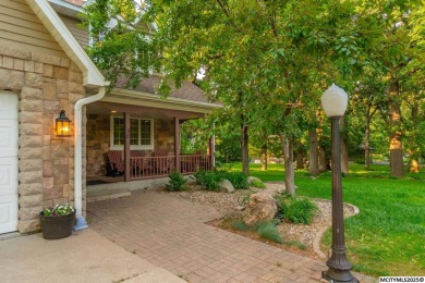 Nestled on over an acre on a scenic private drive, this on Highland Park Golf Course in Iowa - for sale on GolfHomes.com, golf home, golf lot