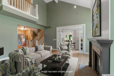 Nestled on over an acre on a scenic private drive, this on Highland Park Golf Course in Iowa - for sale on GolfHomes.com, golf home, golf lot