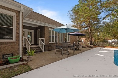 Discover the charm of this all-brick ranch home with a pool and on Baywood Golf Club in North Carolina - for sale on GolfHomes.com, golf home, golf lot