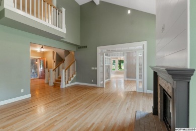 Nestled on over an acre on a scenic private drive, this on Highland Park Golf Course in Iowa - for sale on GolfHomes.com, golf home, golf lot