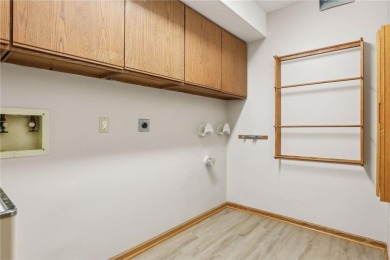 This spacious end unit townhome is beautifully situated on a on Oak Glen Golf Club  in Minnesota - for sale on GolfHomes.com, golf home, golf lot