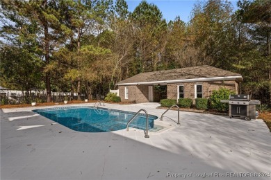 Discover the charm of this all-brick ranch home with a pool and on Baywood Golf Club in North Carolina - for sale on GolfHomes.com, golf home, golf lot