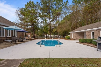 Discover the charm of this all-brick ranch home with a pool and on Baywood Golf Club in North Carolina - for sale on GolfHomes.com, golf home, golf lot