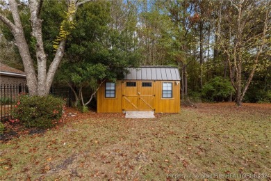 Discover the charm of this all-brick ranch home with a pool and on Baywood Golf Club in North Carolina - for sale on GolfHomes.com, golf home, golf lot