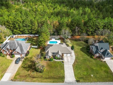 Discover the charm of this all-brick ranch home with a pool and on Baywood Golf Club in North Carolina - for sale on GolfHomes.com, golf home, golf lot