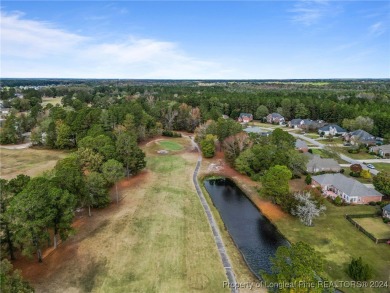 Discover the charm of this all-brick ranch home with a pool and on Baywood Golf Club in North Carolina - for sale on GolfHomes.com, golf home, golf lot