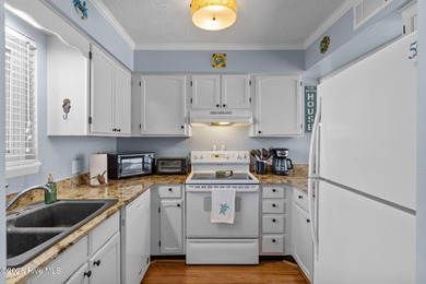 Welcome to Oak Island Beach Villas. Experience stunning, direct on Oak Island Golf Club in North Carolina - for sale on GolfHomes.com, golf home, golf lot