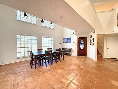 This classic-style 2-story residence is a statement of elegance on Rockport Country Club in Texas - for sale on GolfHomes.com, golf home, golf lot