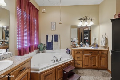 Welcome to 702 Copper Oaks Drive, a stunning 4-bedroom, 3-bath on Briarbrook Golf Course in Missouri - for sale on GolfHomes.com, golf home, golf lot