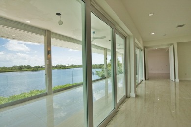 Nestled in a serene enclave, this exceptional property on Coral Creek Club in Florida - for sale on GolfHomes.com, golf home, golf lot