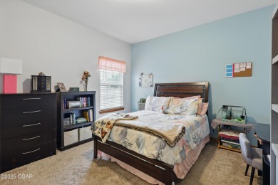 Welcome to 702 Copper Oaks Drive, a stunning 4-bedroom, 3-bath on Briarbrook Golf Course in Missouri - for sale on GolfHomes.com, golf home, golf lot