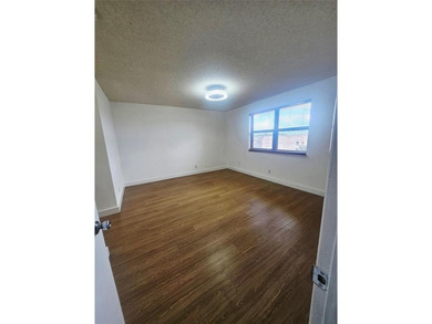 bBeautifully maintained 55+ end-unit condo. This light-filled on Sunrise Lakes Phase III in Florida - for sale on GolfHomes.com, golf home, golf lot