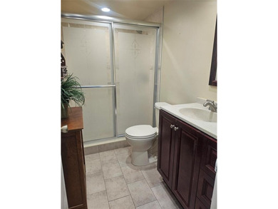 Beautifully maintained 55+ end-unit condo. This light-filled on Sunrise Lakes Phase III in Florida - for sale on GolfHomes.com, golf home, golf lot