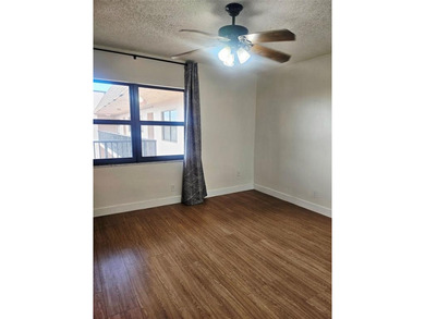 Beautifully maintained 55+ end-unit condo. This light-filled on Sunrise Lakes Phase III in Florida - for sale on GolfHomes.com, golf home, golf lot