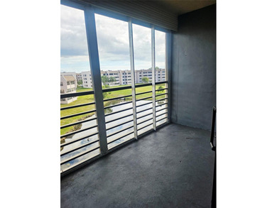 Beautifully maintained 55+ end-unit condo. This light-filled on Sunrise Lakes Phase III in Florida - for sale on GolfHomes.com, golf home, golf lot