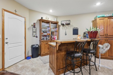 Welcome to 702 Copper Oaks Drive, a stunning 4-bedroom, 3-bath on Briarbrook Golf Course in Missouri - for sale on GolfHomes.com, golf home, golf lot