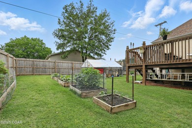 Welcome to 702 Copper Oaks Drive, a stunning 4-bedroom, 3-bath on Briarbrook Golf Course in Missouri - for sale on GolfHomes.com, golf home, golf lot