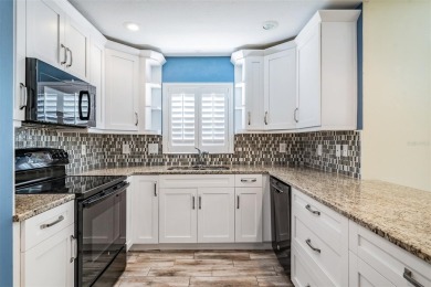 COME live in SUNNY Florida in Tampa Bay Golf and Country Club on Tampa Bay Golf and Country Club in Florida - for sale on GolfHomes.com, golf home, golf lot